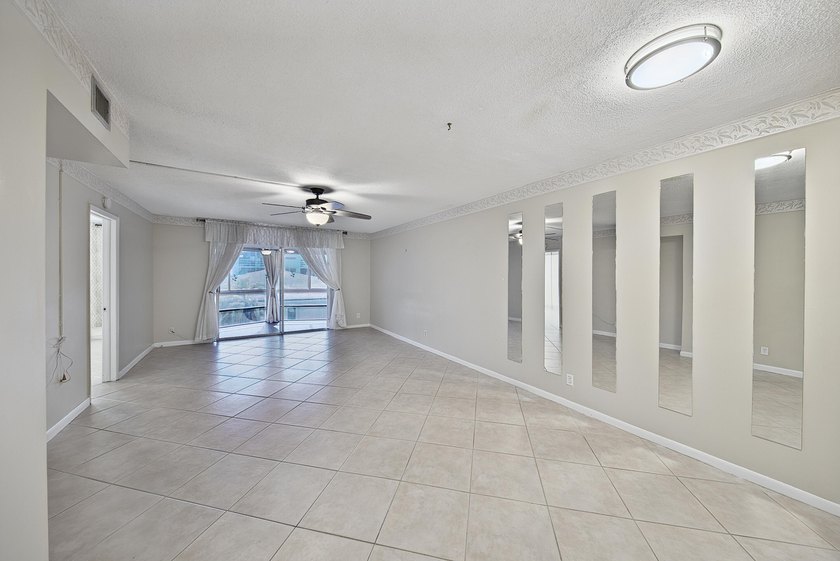LOVELY EAST FACING UPDATED 2/2 second floor garden view unit in - photo 9