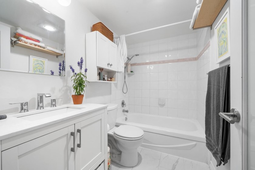 Welcome to Sunset West, a beautifully updated corner residence - photo 15
