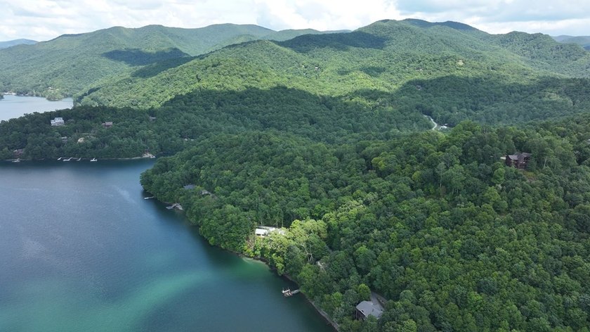 Unique 10.5 ACRES Nestled(lakefront) acres in the serene, wooded - photo 7
