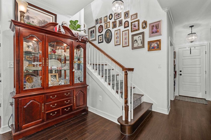 Step into a home where custom craftsmanship, exceptional storage - photo 20