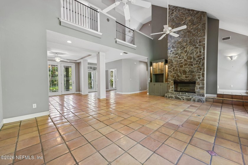 Nestled beneath a canopy of majestic live oaks and surrounded by - photo 10