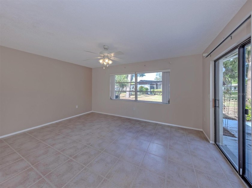 This beautifully maintained two-bedroom, two-bath villa offers - photo 8