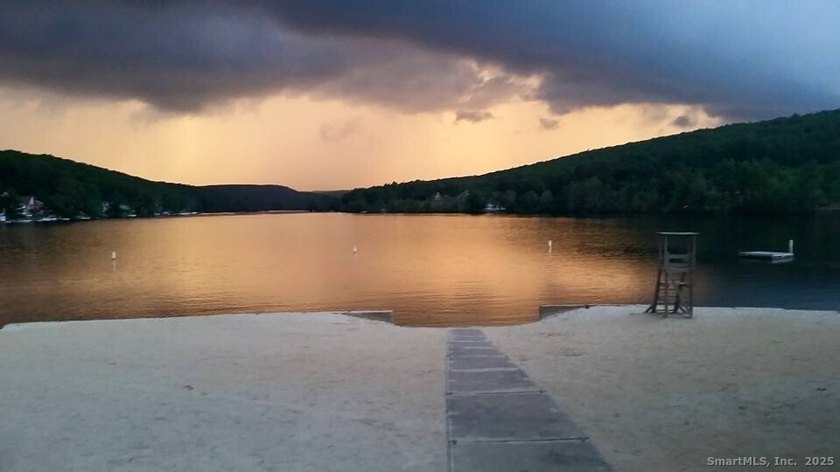 A lot with a spectacular view overlooks the lake. Imagine your - photo 4