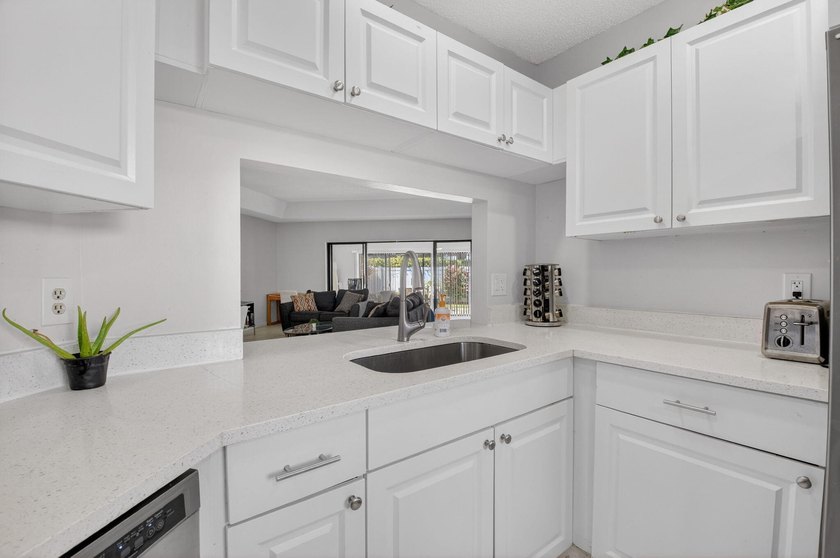 This beautifully renovated 3-bedroom, 2-bath home is tucked away - photo 15
