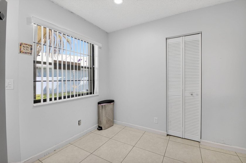 This beautifully renovated 3-bedroom, 2-bath home is tucked away - photo 16