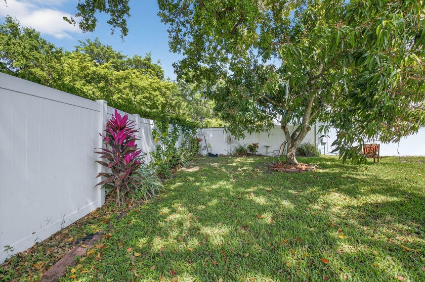 This beautifully renovated 3-bedroom, 2-bath home is tucked away - photo 32