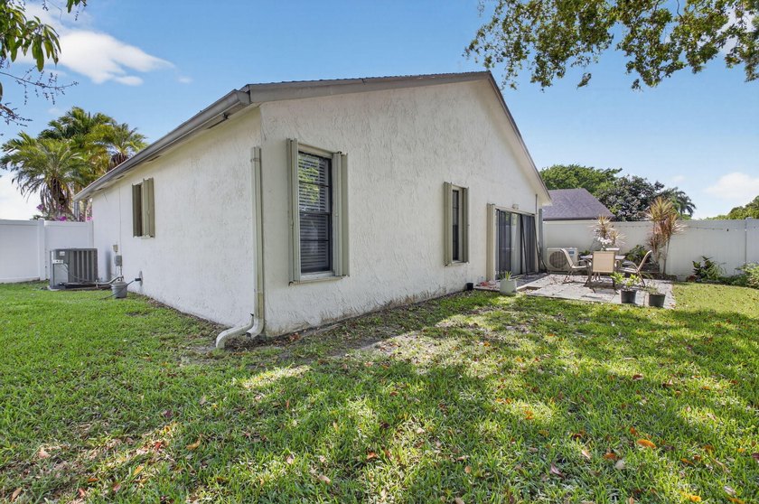 This beautifully renovated 3-bedroom, 2-bath home is tucked away - photo 33