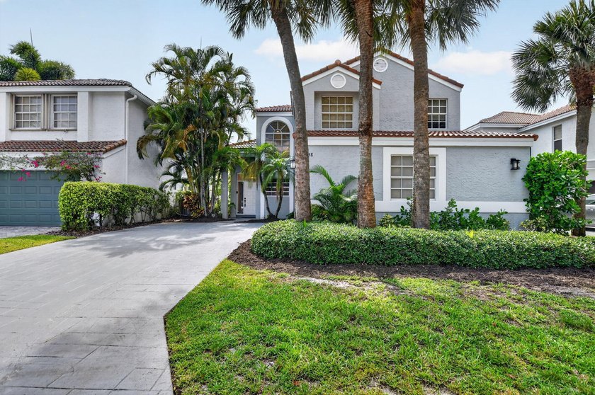 Welcome to this beautifully maintained lakefront home nestled in - photo 2