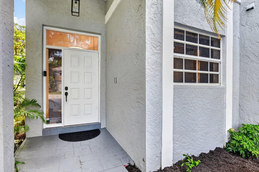 Welcome to this beautifully maintained lakefront home nestled in - photo 4