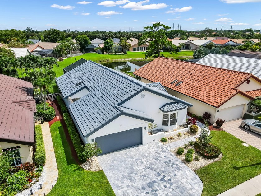 Welcome to Boca Woods Country Club. Exceptional updated home - photo 2