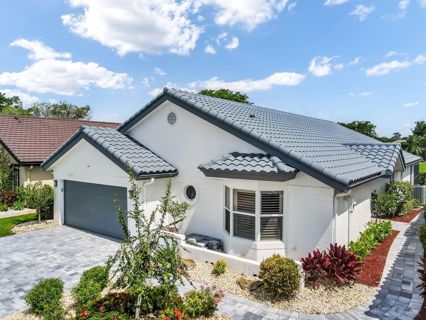 Welcome to Boca Woods Country Club. Exceptional updated home - photo 3