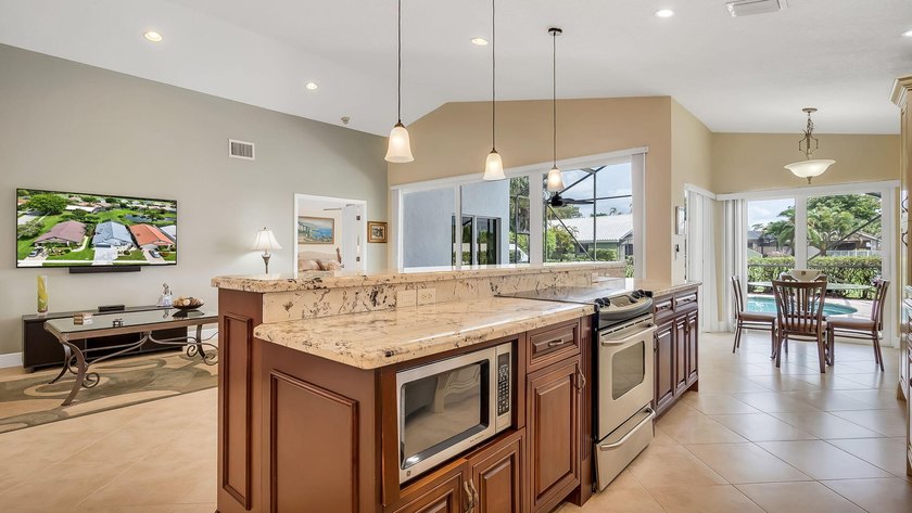Welcome to Boca Woods Country Club. Exceptional updated home - photo 9