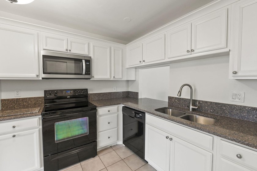 $2,500 credit to all buyers!Enjoy peaceful lakefront living - photo 5