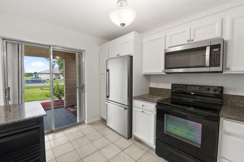 $2,500 credit to all buyers!Enjoy peaceful lakefront living - photo 6