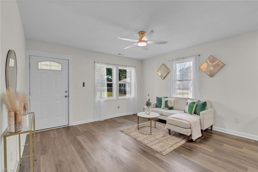 Fully renovated 3 bedroom, 2 bath ranch offering modern finishes - photo 9