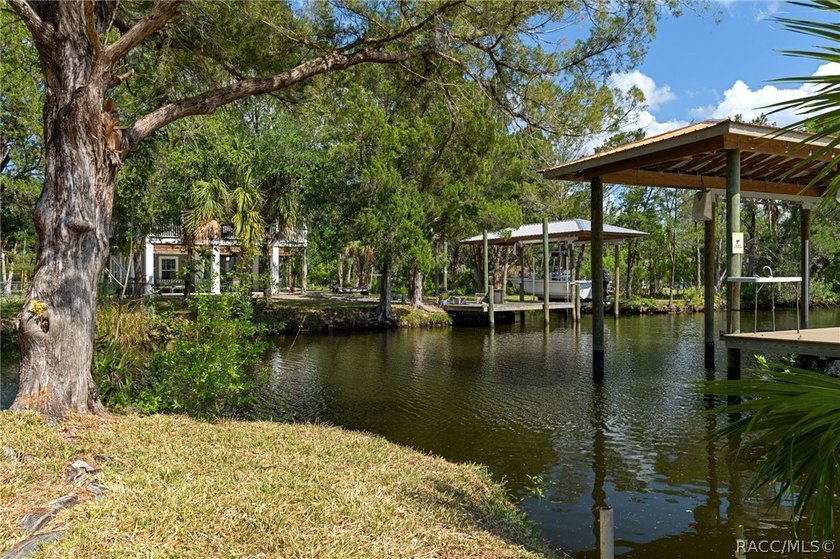 This brand-new stilt home sits on a deep-water canal in the - photo 41