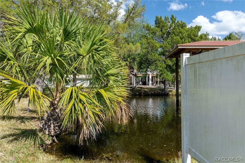 This brand-new stilt home sits on a deep-water canal in the - photo 42