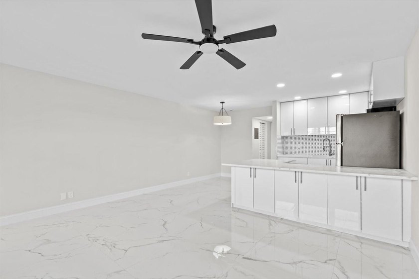 Totally gutted and fully renovated from top to bottom condo in - photo 3