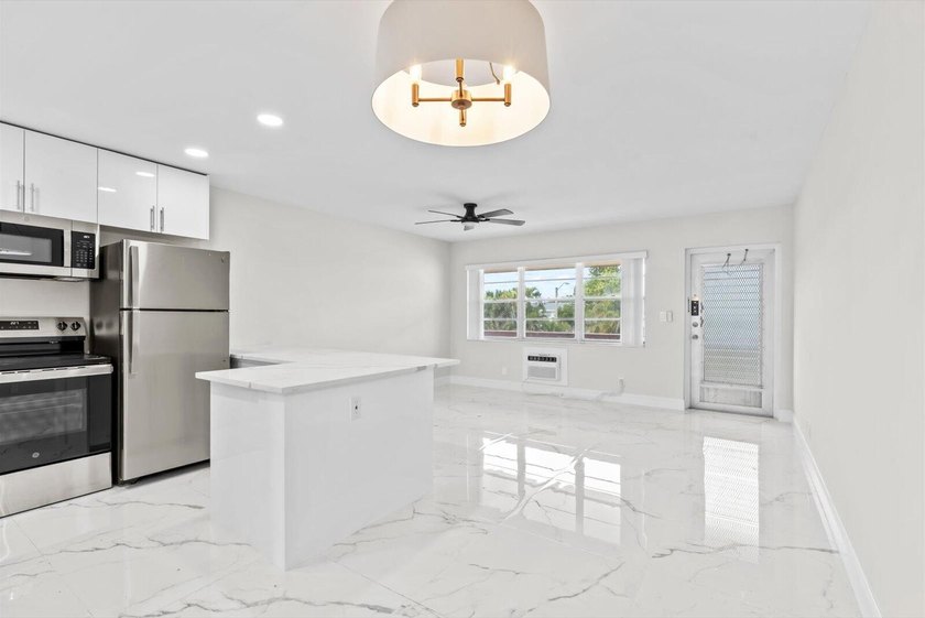 Totally gutted and fully renovated from top to bottom condo in - photo 5