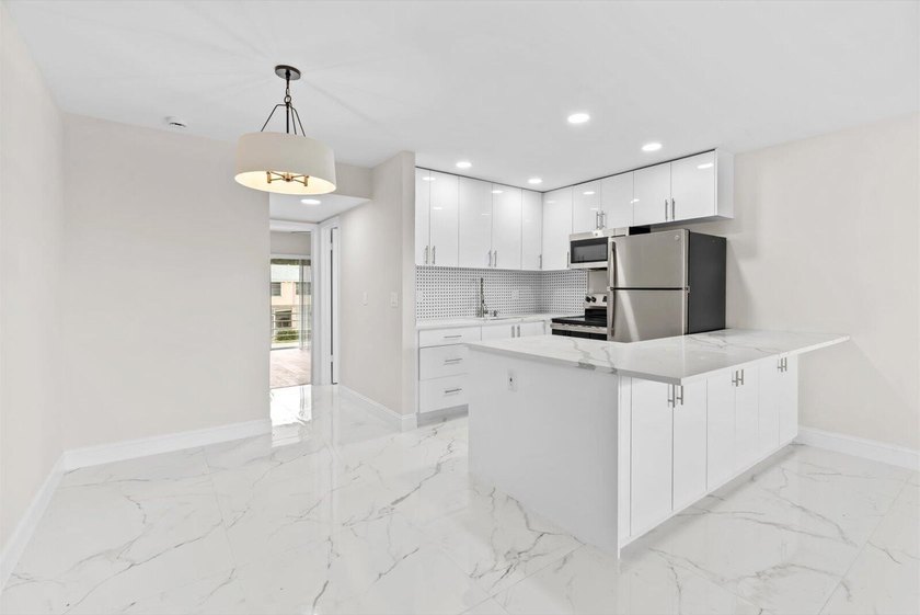 Totally gutted and fully renovated from top to bottom condo in - photo 6