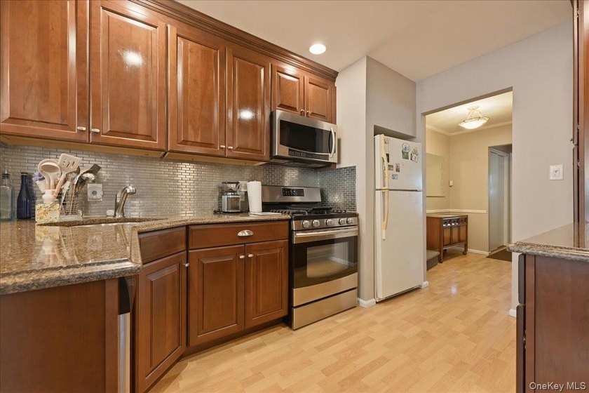 A charming expanded 3-bedroom, 2.5-bath split-level home located - photo 11