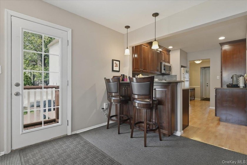 A charming expanded 3-bedroom, 2.5-bath split-level home located - photo 13