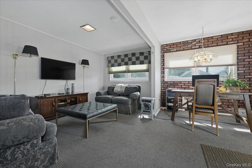 A charming expanded 3-bedroom, 2.5-bath split-level home located - photo 14