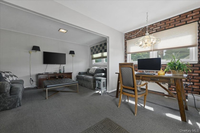 A charming expanded 3-bedroom, 2.5-bath split-level home located - photo 15