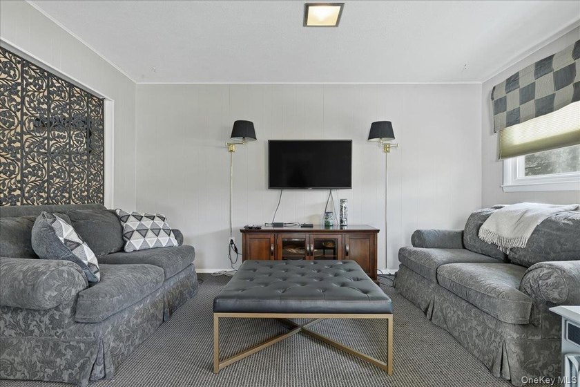 A charming expanded 3-bedroom, 2.5-bath split-level home located - photo 16