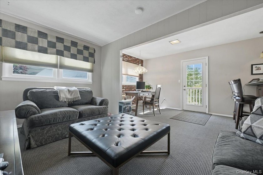 A charming expanded 3-bedroom, 2.5-bath split-level home located - photo 17