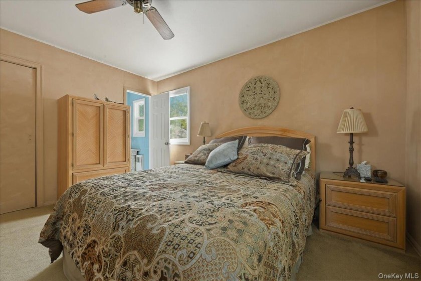 A charming expanded 3-bedroom, 2.5-bath split-level home located - photo 20