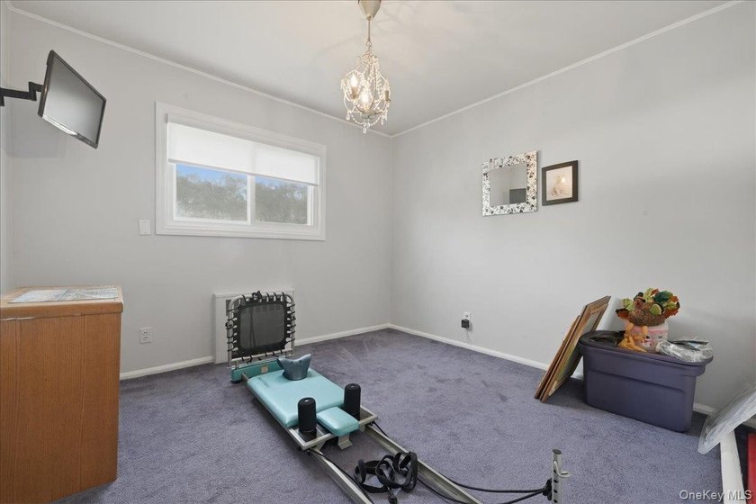 A charming expanded 3-bedroom, 2.5-bath split-level home located - photo 23