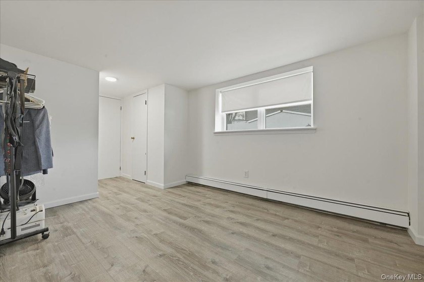 A charming expanded 3-bedroom, 2.5-bath split-level home located - photo 29