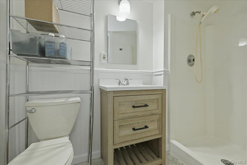 A charming expanded 3-bedroom, 2.5-bath split-level home located - photo 31