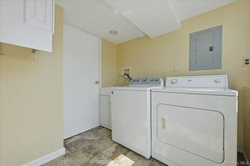 A charming expanded 3-bedroom, 2.5-bath split-level home located - photo 32