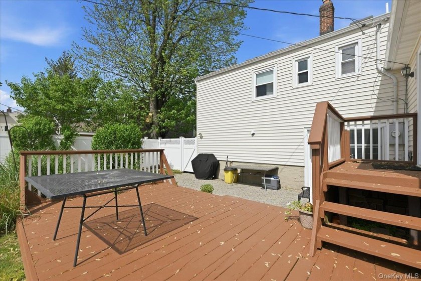 A charming expanded 3-bedroom, 2.5-bath split-level home located - photo 35