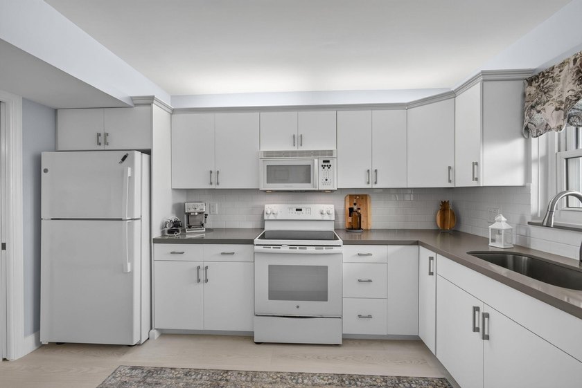 Experience exceptional waterfront living in this beautifully - photo 16