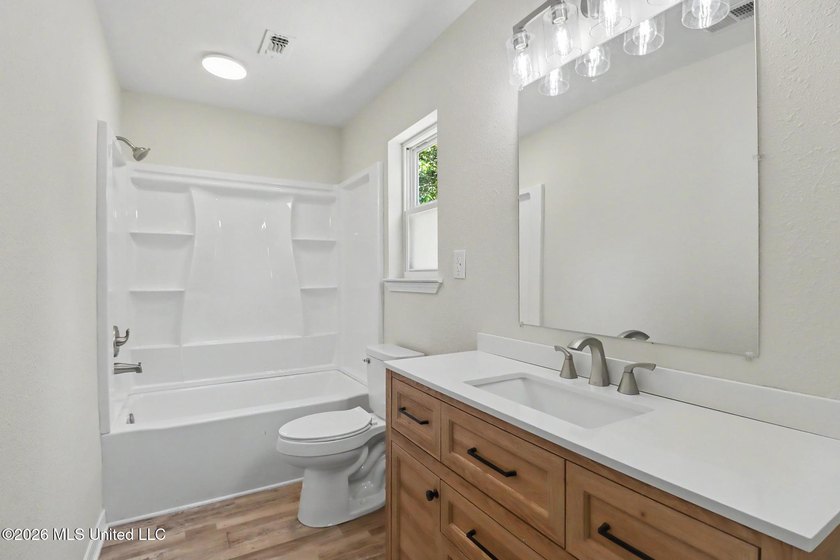 Welcome home to this stunning, fully remodeled residence that - photo 22