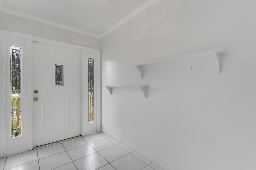 Don't miss this sprawling 3-bedroom, 2-bath CBS home, newly - photo 3