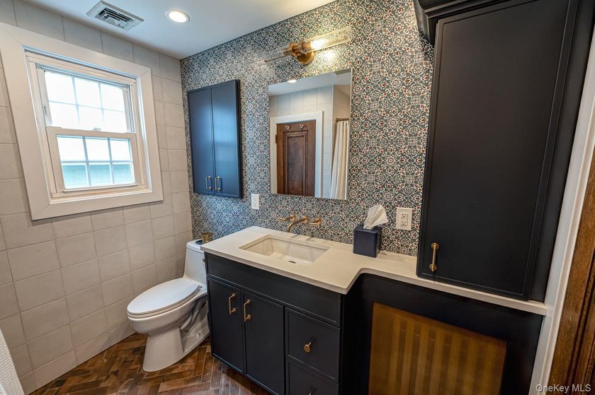 Oozing with charm this meticulously maintained brick Tudor is a - photo 20