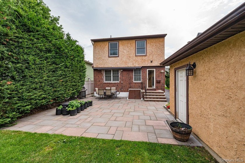 Oozing with charm this meticulously maintained brick Tudor is a - photo 23