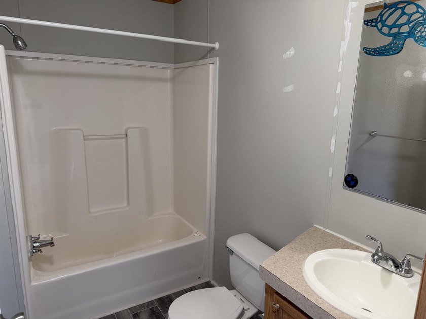 Two-bedroom, two-bathroom Fleetwood mobile home in Foxfire - photo 20