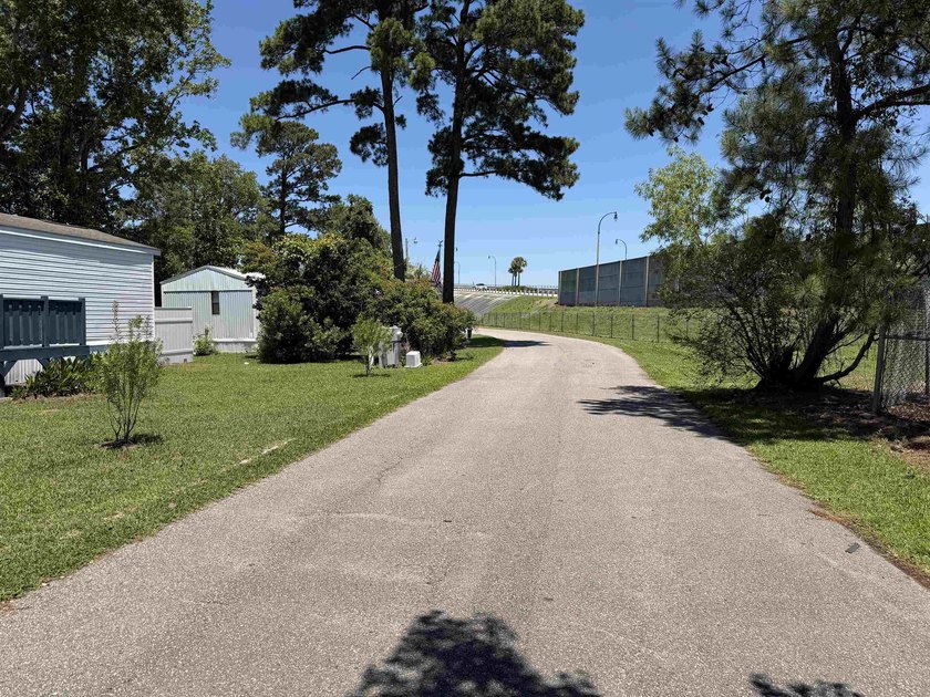Two-bedroom, two-bathroom Fleetwood mobile home in Foxfire - photo 28