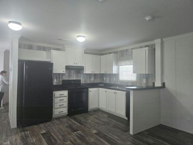 Own your own home in a quiet, well-maintained neighborhood! This - photo 2