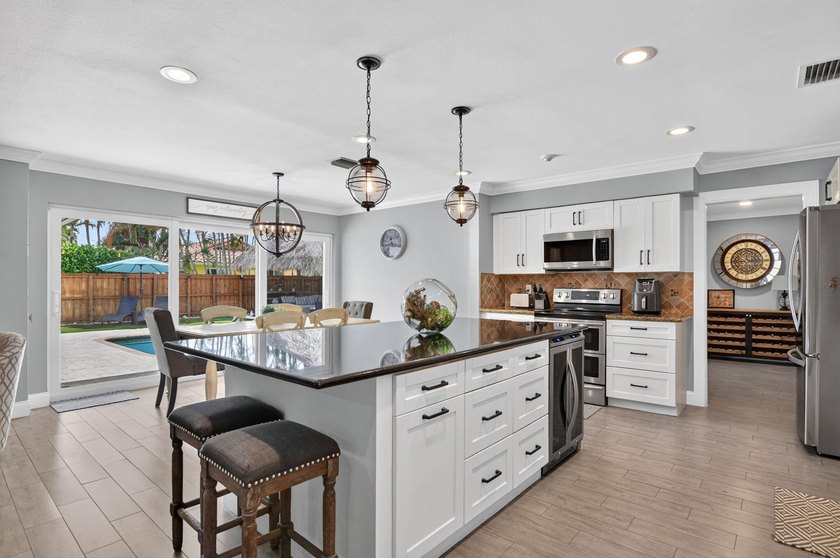 Welcome home to Carriage Hill, one of East Boca Raton's most - photo 6