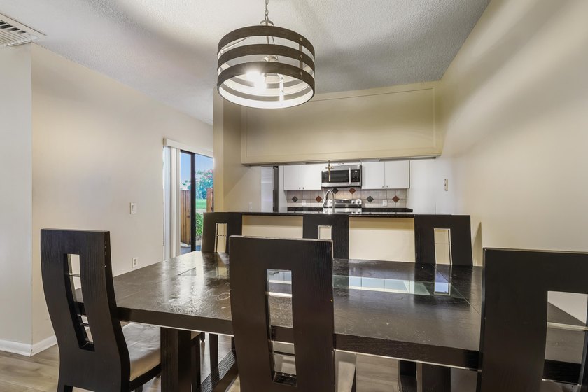 Welcome to this updated 2BR/2.5BA townhouse in the Village of - photo 7