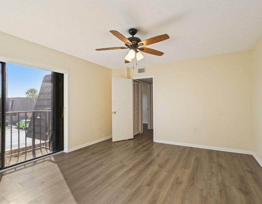 Welcome to this updated 2BR/2.5BA townhouse in the Village of - photo 9