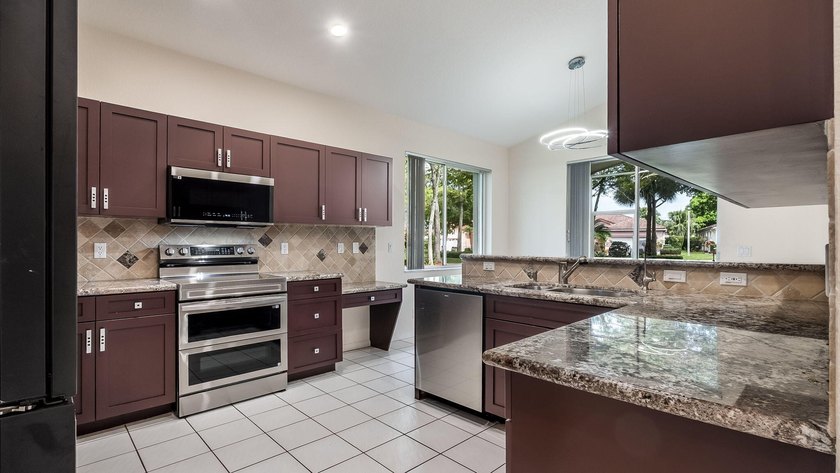 Welcome to your private retreat in the highly sought-after gated - photo 2
