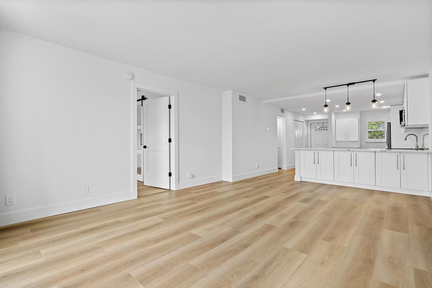 Welcome to Unit 109 at Boca House - a stunning, fully renovated - photo 7