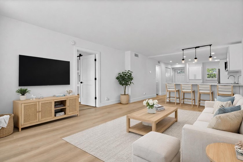 Welcome to Unit 109 at Boca House - a stunning, fully renovated - photo 8